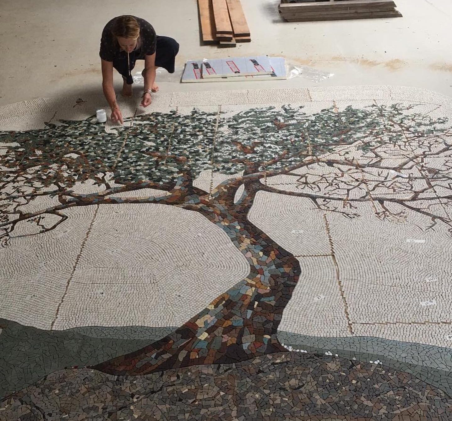 Working on the Hawthorne Tree floor mosaic