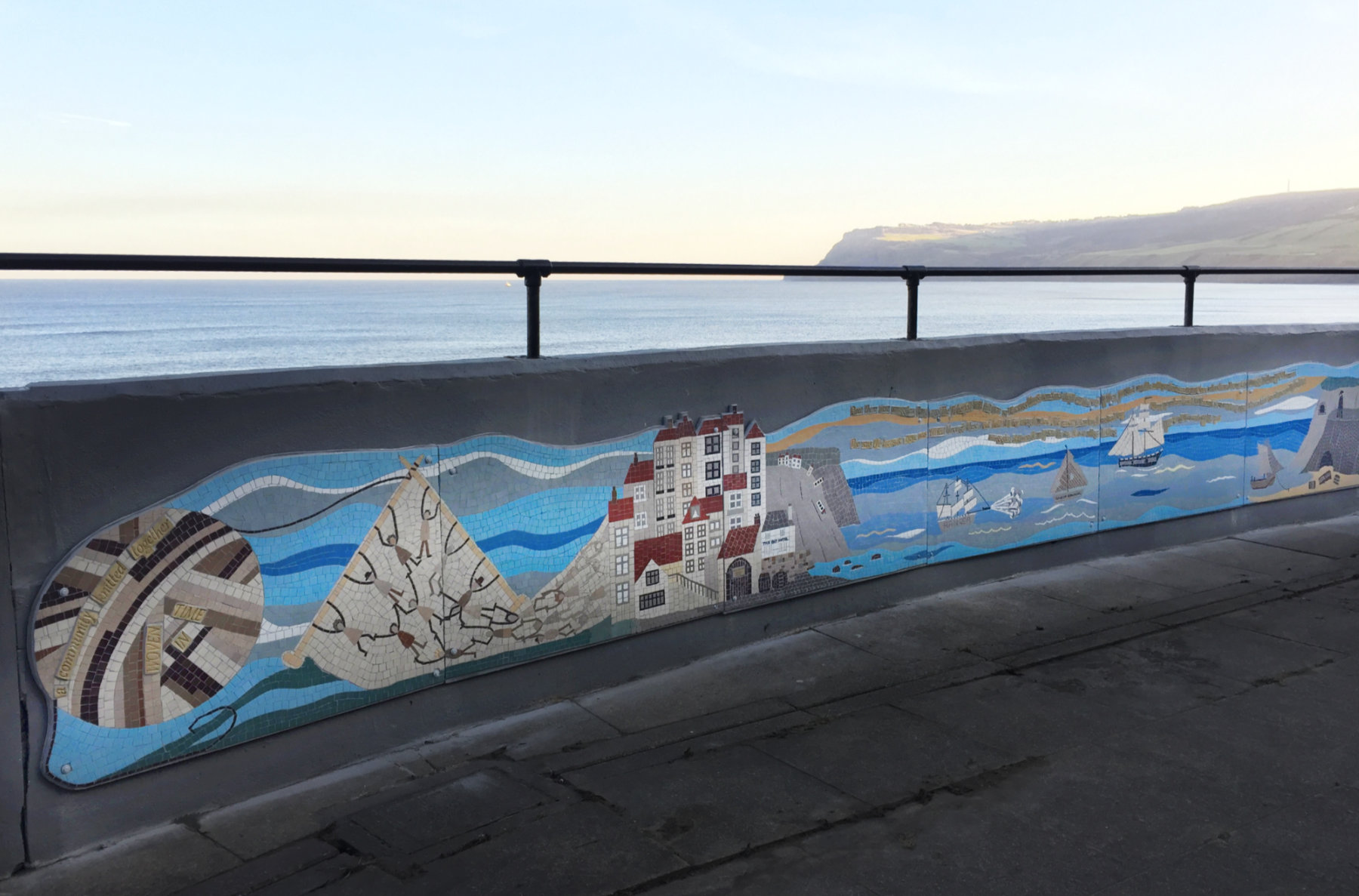 A community knitted together Robin Hood's Bay Mosaic Sea Wall